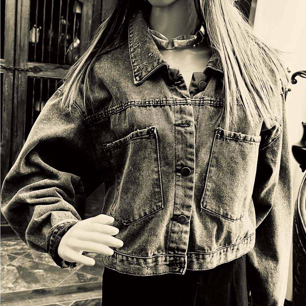 Grunge faded black half denim jacket.